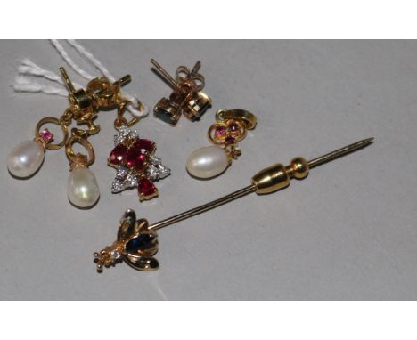 A 14ct yellow gold, ruby and diamond pendant, a yellow metal insect stick pin, a ruby and pearl pendant and two pairs of earr