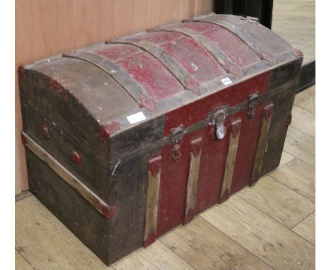 A large metal bound domed topped trunk, W.87cm