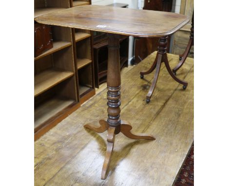 An early 19th century mahogany tripod table