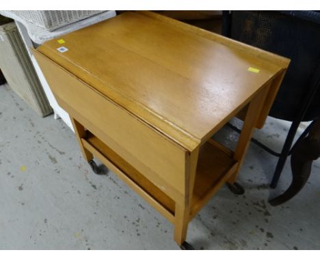 A vintage light oak two-tier drop leaf tea trolley, 62 x 61 x 85cms