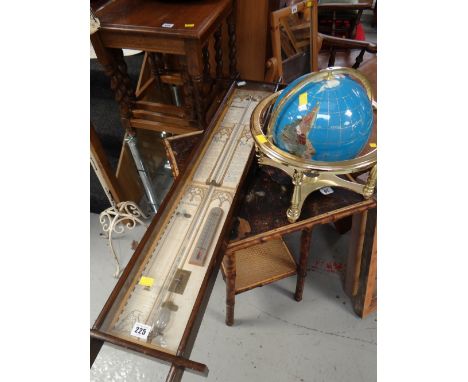 An Admiral Fitzroy barometer together with a decorative globe