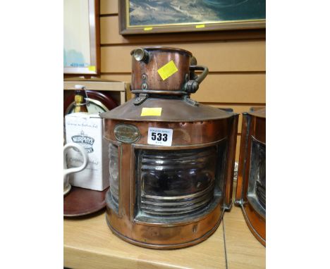 A polished copper mast head light converted to electricity E/T