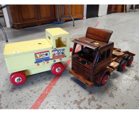 Two children's wooden model play lorries