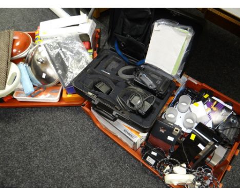 Two crates of various household items including a Blaupunkt video recorder, laptop stand, kitchen items etc