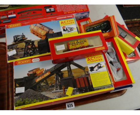 Collection of Hornby OO boxed accessories including operating tipper R8132, operating conveyor R8131, four boxed wagons R6530