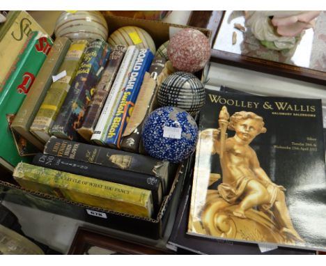 Parcel of vintage hardback books, ceramic spheres together with Woolley & Wallis auction catalogues