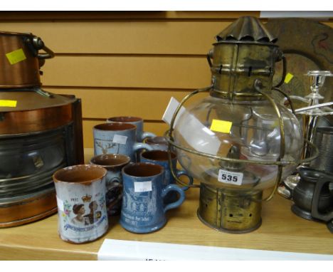 A vintage hanging paraffin lamp, a parcel of Ewenny pottery, various commemorative mugs etc