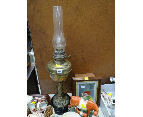 A brass oil lamp converted to electric together with a small wall mounting display case E/T
