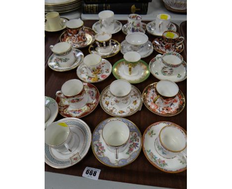 Eighteen various coffee cans & saucers including Shelley, Coalport, Royal Crown Derby, Booth's etc