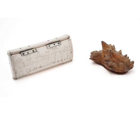 An early 19th Century prisoner of war, carved bone snuff box, with a figure in a river landscape on the cover, with a bridge 