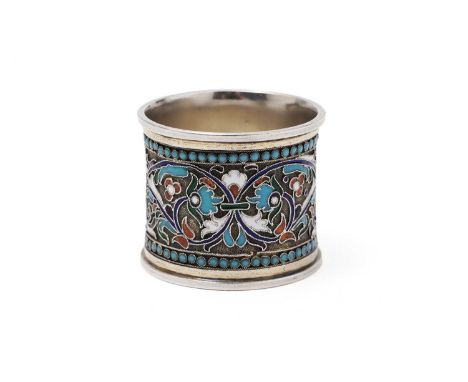 A late 19th/early 20th Century Russian parcel gilt and cloisonné-enamelled napkin ring decorated with floral scrolls in foile