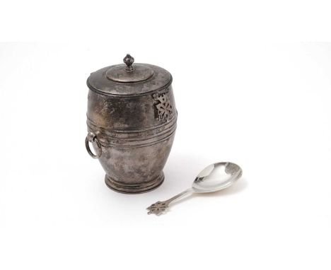 A George V silver tea caddy with drop-ring handles, a pierced clasp closure and matching silver tea caddy spoon, both by Reid