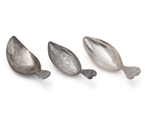 A George III silver caddy spoon, with a leaf-shaped, engraved bowl and a heart-shaped terminal, by William Pugh, Birmingham 1