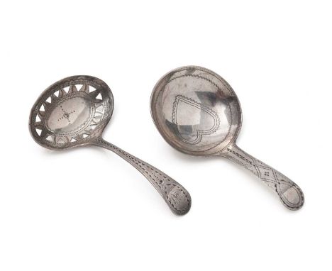 A George III engraved silver caddy spoon, with a heart in the bowl, by George Braiser, London 1789, and another George III si
