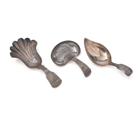 Three silver Birmingham-made caddy spoons: - an engraved example with a fan-shaped bowl by Taylor &amp; Perry 1832, another w