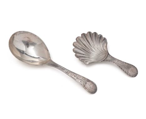 A George III silver caddy spoon, with a scallop-shell shaped bowl and a bright-cut bordered stem by Hester Bateman, London 17