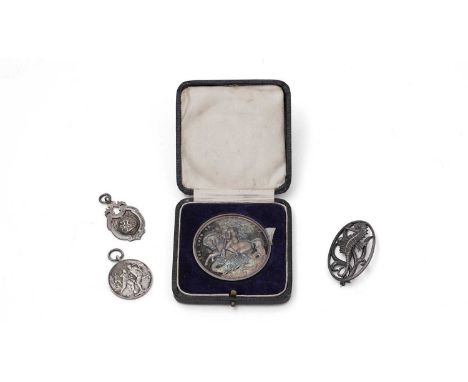 An Elizabeth II silver openwork brooch, oval with a seahorse amongst weeds, sponsor's mark and retailer's mark of George Tarr