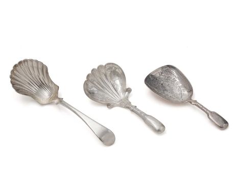 A Victorian silver caddy spoon, with engraving and a hollow Fiddle pattern stem, by Joseph Wilmore, Birmingham 1825, another 