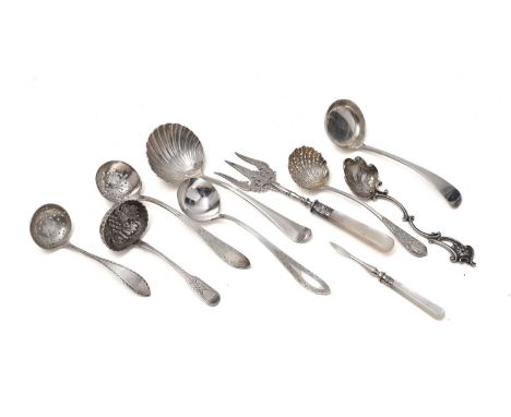 A Victorian cast silver, naturalistic spoon with a leaf bowl, a scrollwork stem and a mask terminal, by John Figg London 1848