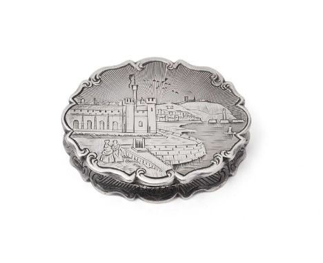 An extremely rare Victorian silver ‘castletop’ vinaigrette, of shaped circular outline, with an engraved view of the ‘gothic 