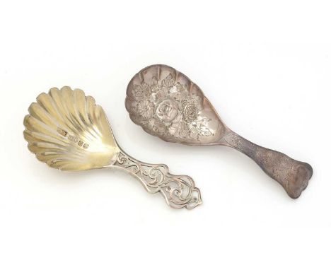 A Victorian silver caddy spoon, with an engraved stem and embossed flowers in the bowl, by George Unite, Birmingham 1848; and