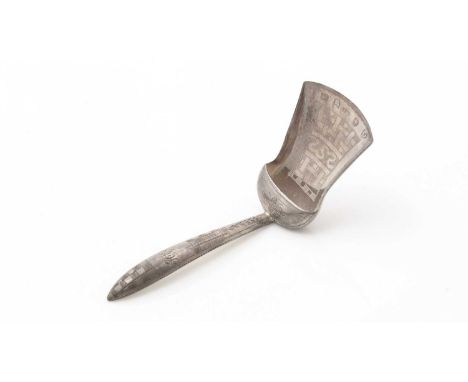A George III engraved silver caddy spoon, with a flaring bowl and a hollow, pointed stem, initialled, by Taylor &amp; Thropp,