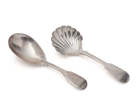 Two North County antique silver caddy spoons, with Fiddle pattern stems: - one with a plain bowl, initialled "W M D", by J. B