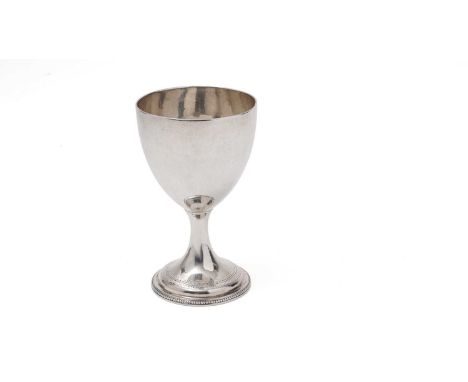 A George III silver goblet with an engraved and beaded pedestal foot, crested, by Charles Wright, London 1780, 14cm high, 5.4