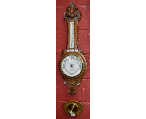 An early 20th century E Elam banjo barometer/thermometer, carved oak case, white scale and dial marked E Elam, Northwich, Mid