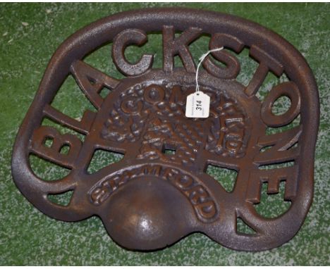 A reproduction cast iron Blackstone & Company, Stamford tractor seat.