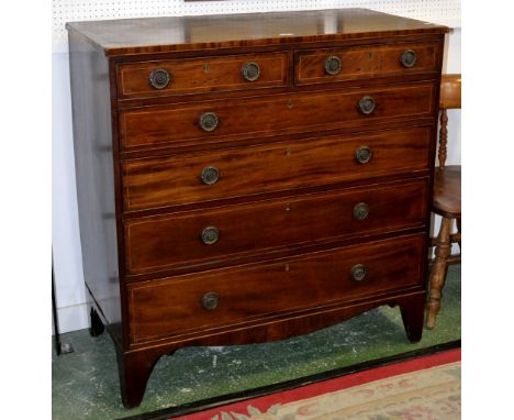 A George III mahogany chest, moulded oversailing top above two short over three long graduated drawers, inlaid throughout, ro