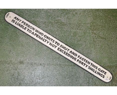 A reproduction cast iron LNER sign reading Any person who omits shut and fasten this gate is liable to a penalty not exceedin