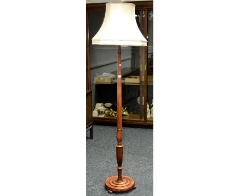 An early 20th century mahogany standard lamp