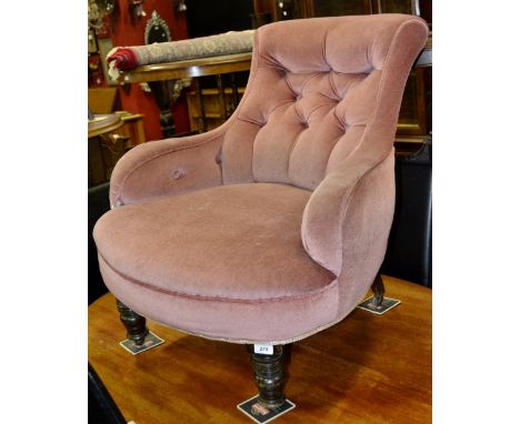 A Victorian button back nursing chair, circa 1880.