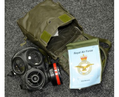 A RAF gas mask in case, dated 1960, with original instruction manual