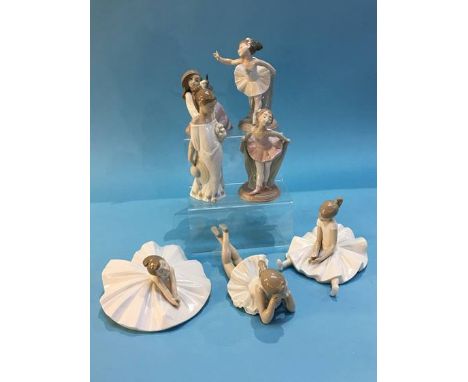 Collection of seven Nao figures