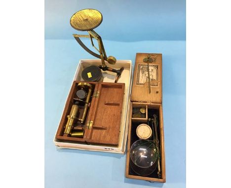 Set of postal scales, a compass, a field microscope and a set of balance scales
