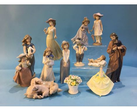 Collection of various figures including Lladro, Nao etc.