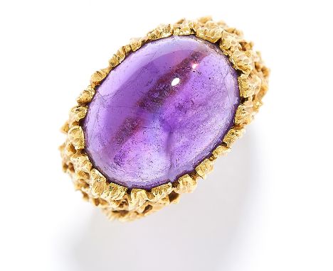 AMETHYST DRESS RING in 18ct yellow gold, in Modernist style set with a cabochon amethyst, stamped 18K, size O / 7, 10.7g.