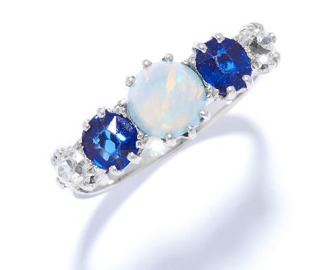 AN OPAL, SAPPHIRE AND DIAMOND DRESS RING in white gold or platinum, set with a cabochon opal between two cushion cut sapphire