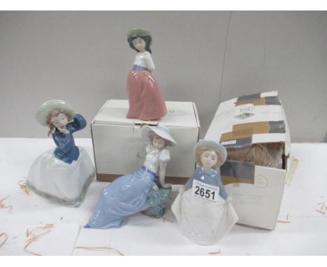 4 NAO figures including Seated Lady with Bird, Girl on Placid Walk (with box), Girl with Long White Shirt (with box) and Girl