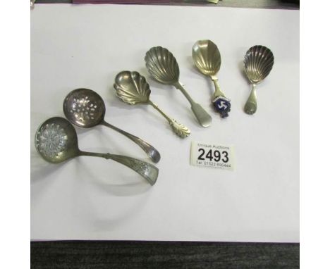 4 silver plate caddy spoons and 2 sifter spoons.