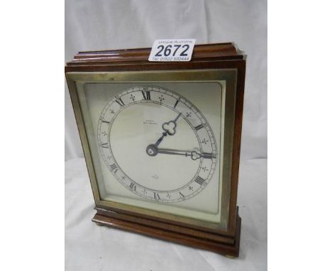 A mid 20th century Elliot mantel clock by W.H.May, Nottingham.