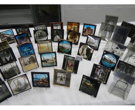 2 boxes of glass magic lantern slides.