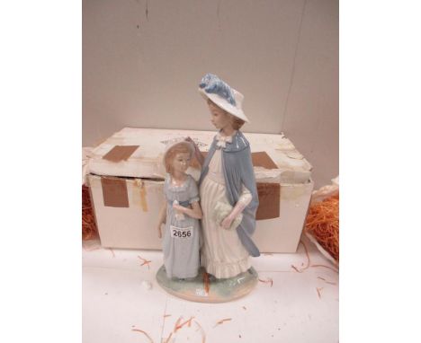 A large NAO figure group of a Mother and Daughter in Sunday Best (with box)