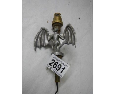 An unusual Bacardi Bat light fitting.