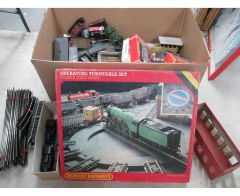 Box containing quantity of 00 scale Hornby Railways rolling stock, accessories and track