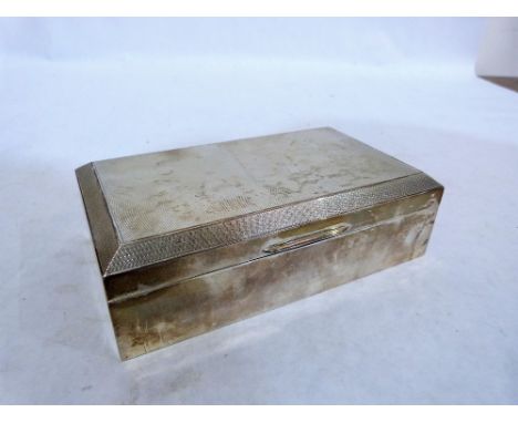 An Elizabeth II silver engine turned cigarette box. Cedar lined. 6¾'' wide. Birmingham 1968
