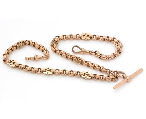 A 9ct yellow gold fancy link Albert chain, of facetted circular and pierced links, with T-bar and clasps, 40.5cms long, 25.0g