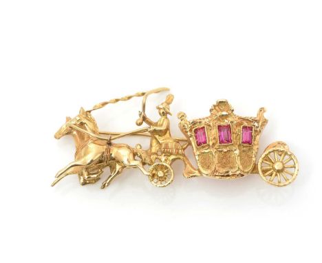 An 18ct yellow gold and ruby brooch, in the form of a horse-drawn carriage, the windows of the carriage set with three rectan